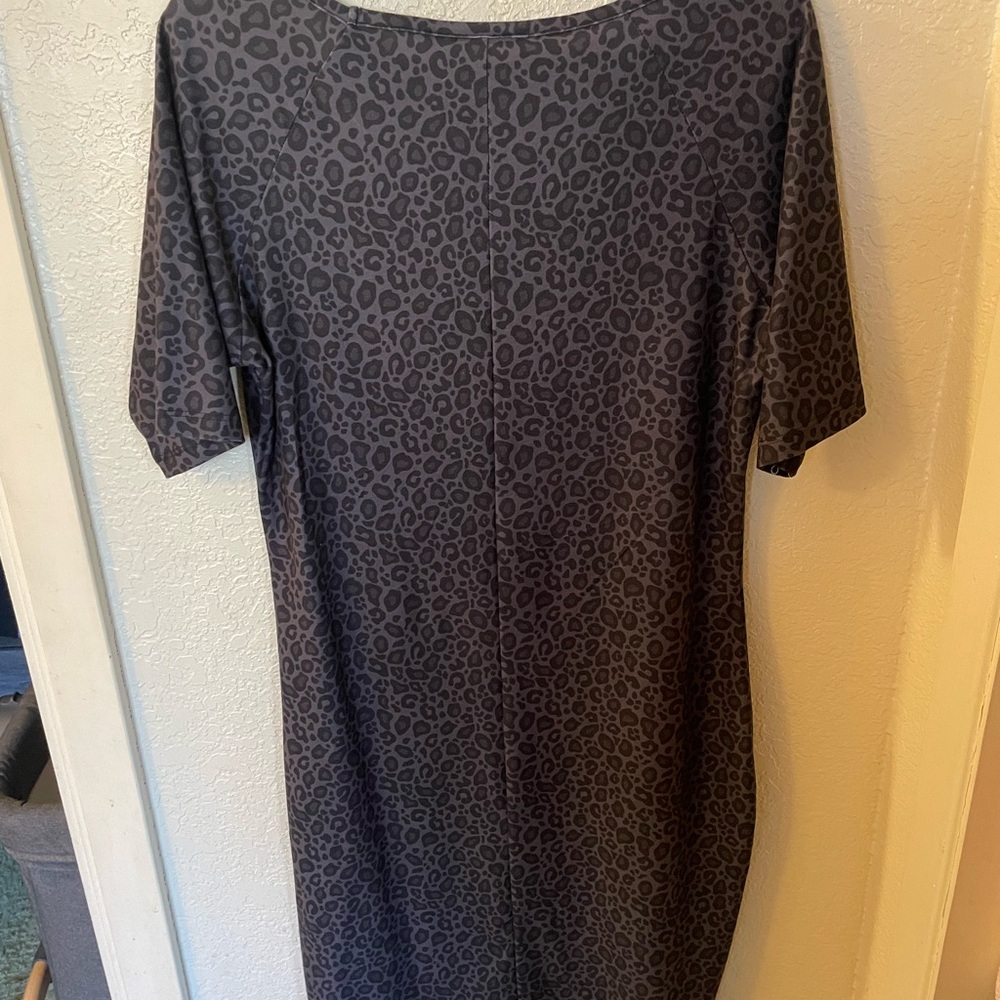 Size M Charlie’s Project black leopard print fitted dress